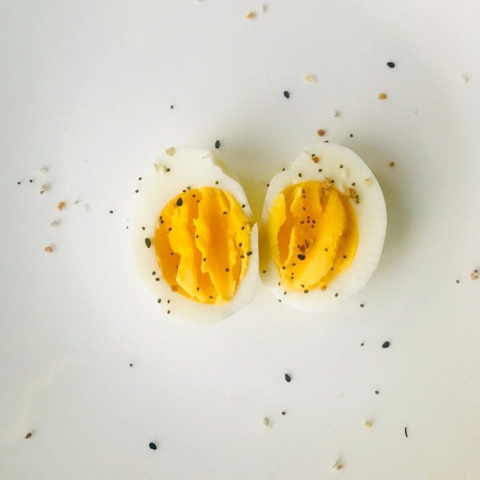 sliced boiled egg on white plate