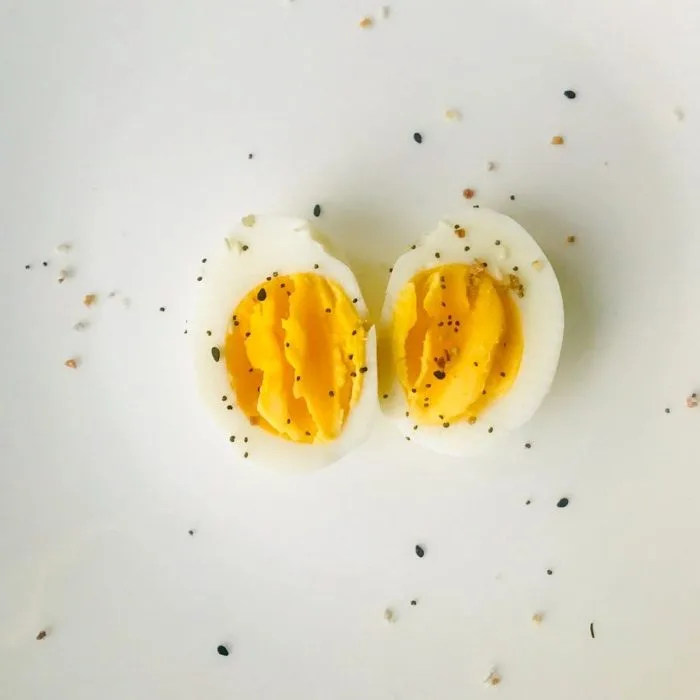sliced boiled egg on white plate